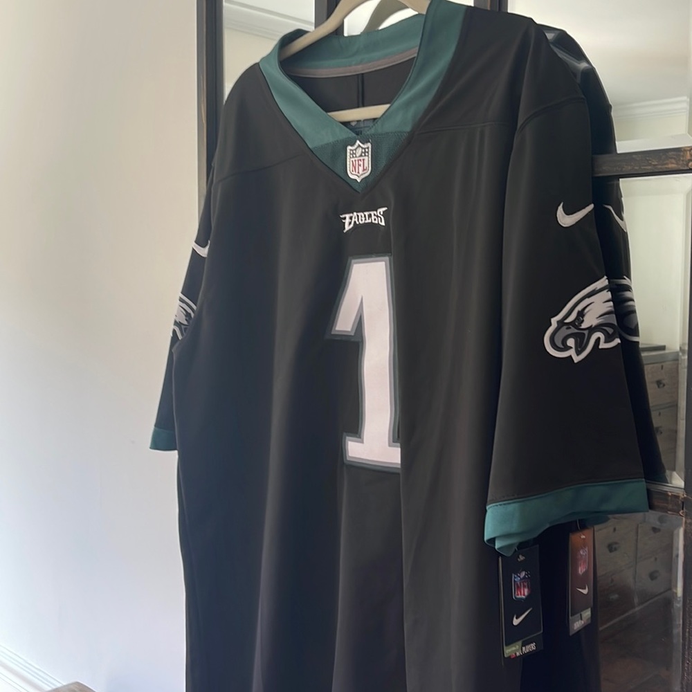 Nike Men's Black and Teal Jersey